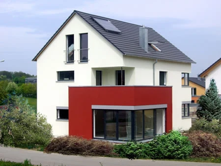 Wohnhaus mit Loggia – Einfamilienhäuser